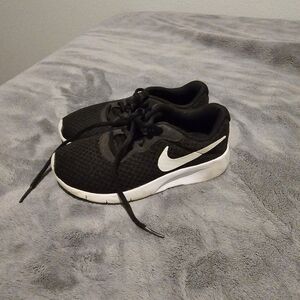 Boys 1Y Used Nike Jordan shoes in black and white. 